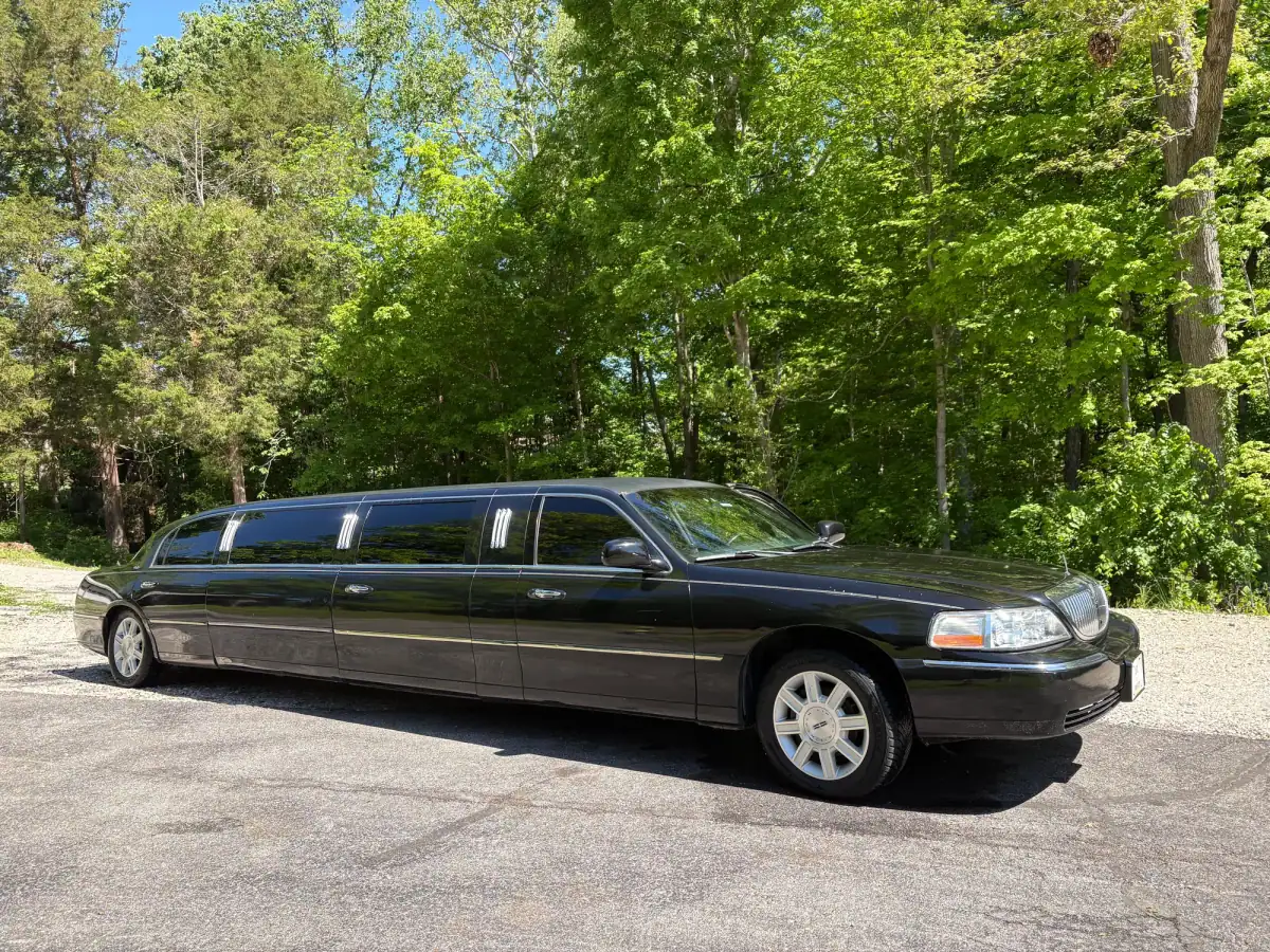 Black stretch limousine parked outdoors
